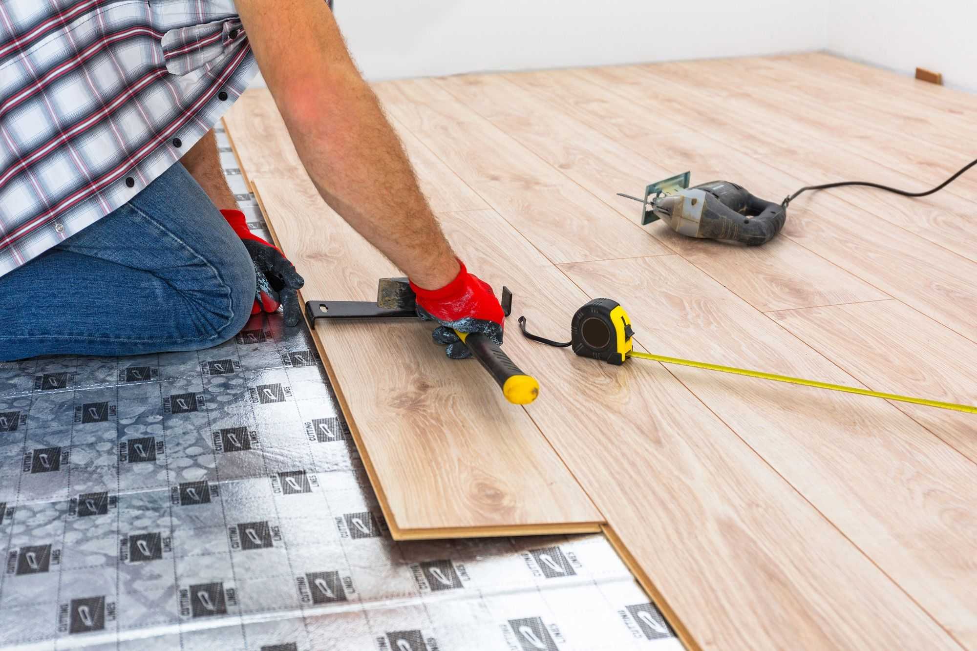 installing new laminated wooden floors